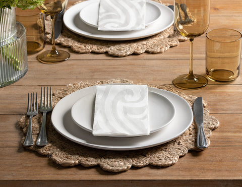 Catering table setting with disposable napkins and plates